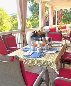 Enjoy our breakfast on our beautiful wraparound veranda or in your room