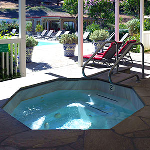 Hot tub next to the pool